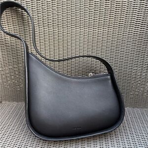 The Row Half Moon Bag in Leather Black